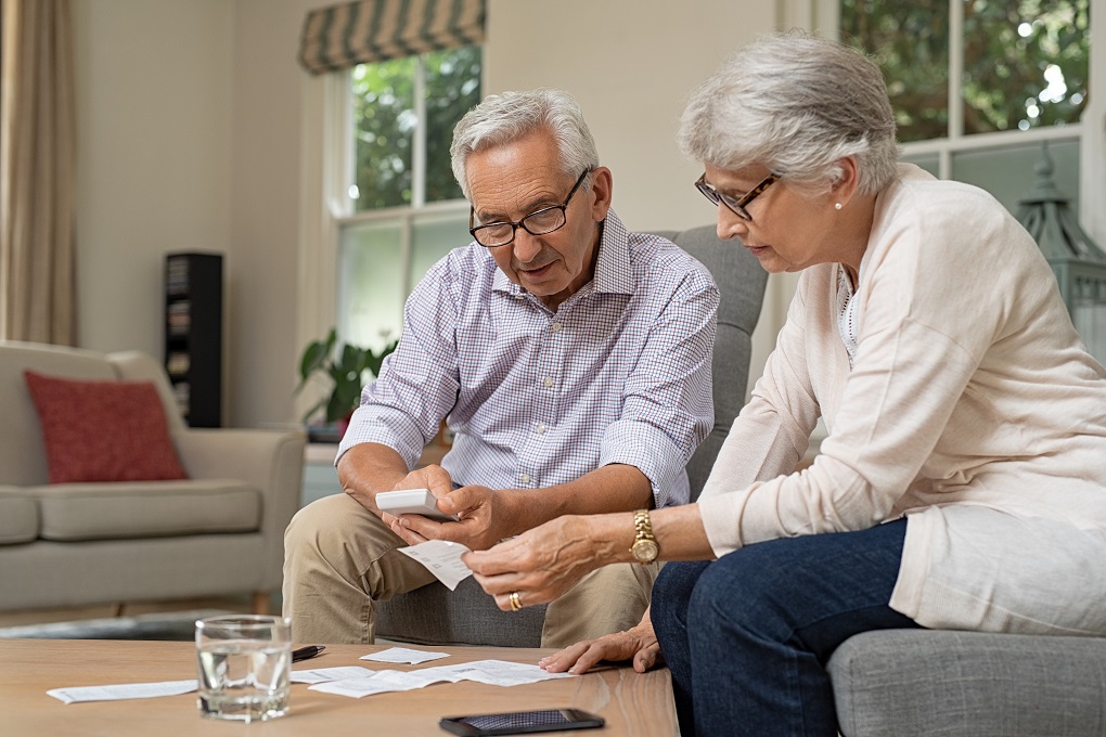 Seniors consulting debt protection insurance